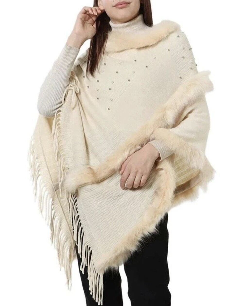 Northern Angel Anthropologie poncho features cream-colored faux fur trim and pea
